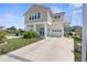 Two-story home with attached garage and balcony at 6412 Yvette Dr, Hudson, FL 34667