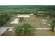 Aerial view showcasing the property's size and equestrian features at 4148 Batten Rd, Brooksville, FL 34602