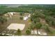 Aerial view showing property's size and equestrian features at 4148 Batten Rd, Brooksville, FL 34602