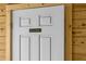 White door to tack room with gold lettering at 4148 Batten Rd, Brooksville, FL 34602