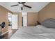 Spacious bedroom with large bed and ceiling fan at 4148 Batten Rd, Brooksville, FL 34602