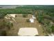 Aerial view of property showcasing expansive land and equestrian facilities at 4148 Batten Rd, Brooksville, FL 34602