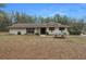 Ranch style home with brick facade and a spacious yard at 4148 Batten Rd, Brooksville, FL 34602