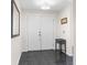 Entryway with double doors and dark tile flooring at 4148 Batten Rd, Brooksville, FL 34602