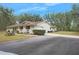 Brick home with attached garage and large driveway at 4148 Batten Rd, Brooksville, FL 34602