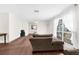 Living room with wood-look floors and ample natural light at 4148 Batten Rd, Brooksville, FL 34602