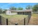 Ranch-style home with screened porch and fenced yard at 4148 Batten Rd, Brooksville, FL 34602