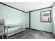 Unfinished basement room with stainless steel table at 4148 Batten Rd, Brooksville, FL 34602