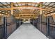 Clean and spacious barn with individual horse stalls at 4148 Batten Rd, Brooksville, FL 34602