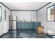 Small basement kitchenette with stainless steel appliances at 4148 Batten Rd, Brooksville, FL 34602