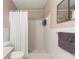 Simple bathroom with shower stall and white tile at 2260 Costa Rican Dr # 24, Clearwater, FL 33763