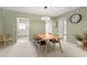 Dining area with a view into the kitchen and living areas at 2260 Costa Rican Dr # 24, Clearwater, FL 33763