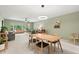 Dining area with wood table and seating at 2260 Costa Rican Dr # 24, Clearwater, FL 33763