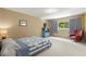 Spacious bedroom with large window and comfortable seating at 2260 Costa Rican Dr # 24, Clearwater, FL 33763