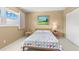 Bright bedroom with a comfortable bed and ample closet space at 2260 Costa Rican Dr # 24, Clearwater, FL 33763
