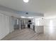 Modern kitchen with stainless steel appliances and white cabinets at 6005 Soaring Ave, Temple Terrace, FL 33617