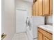 Laundry room with washer, dryer, and sink at 6419 Cardinal Crest Dr, New Port Richey, FL 34655