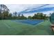 Two well-maintained tennis courts at 11937 Bayonet Ln, New Port Richey, FL 34654