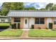 Condo exterior with gray roof and peach-colored siding at 11937 Bayonet Ln, New Port Richey, FL 34654