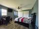 Guest bedroom with a workspace and double bed at 6336 Wooden St, New Port Richey, FL 34653