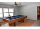 Game room with a pool table and ample space at 6336 Wooden St, New Port Richey, FL 34653