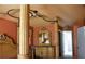 Elegant Primary bedroom with a large four-poster bed and ornate dresser at 6336 Wooden St, New Port Richey, FL 34653
