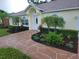House exterior showcasing a meticulously maintained front yard at 6075 Shingler Ave, Spring Hill, FL 34608