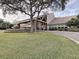 Inviting community center with landscaping and stonework at 2348 Rolling View Dr, Spring Hill, FL 34606