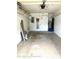 Garage with extra storage and space for car at 7278 Scotland Cir, Weeki Wachee, FL 34613