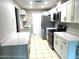 Modern kitchen with stainless steel appliances and white cabinets at 7278 Scotland Cir, Weeki Wachee, FL 34613