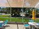 Screened-in patio overlooking pool at 7278 Scotland Cir, Weeki Wachee, FL 34613