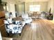 Living room with light flooring, comfortable seating, and dining area at 7278 Scotland Cir, Weeki Wachee, FL 34613