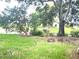 Backyard view of a pond and trees at 7278 Scotland Cir, Weeki Wachee, FL 34613