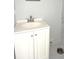 Basic bathroom with white vanity and round sink at 2252 Society Dr, Holiday, FL 34691