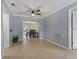 Open dining room with view into living room and kitchen at 9 Grace St, Crystal Beach, FL 34681