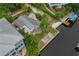 Aerial showcasing a canal-front house with a fire pit at 9 Grace St, Crystal Beach, FL 34681