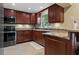 Modern kitchen featuring stainless steel appliances at 9 Grace St, Crystal Beach, FL 34681