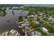 Bird's-eye view of waterfront home nestled in a quiet residential area at 9 Grace St, Crystal Beach, FL 34681