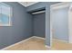 Small bedroom with neutral walls and tile floor at 9 Grace St, Crystal Beach, FL 34681
