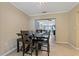 Dining area with view to living room and kitchen at 9 Grace St, Crystal Beach, FL 34681