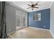Bright sunroom with double doors leading to the outdoors at 9 Grace St, Crystal Beach, FL 34681