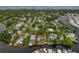 Wide aerial showcasing home's location in waterfront community at 9 Grace St, Crystal Beach, FL 34681