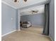 Open concept living room with tile floors and view into adjacent room at 9 Grace St, Crystal Beach, FL 34681