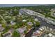 Wide aerial view of the home and surrounding neighborhood at 9 Grace St, Crystal Beach, FL 34681