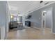 Living room with fireplace and ample natural light at 9 Grace St, Crystal Beach, FL 34681
