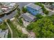 Aerial view of waterfront property and surrounding area at 9 Grace St, Crystal Beach, FL 34681
