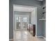 Hallway with access to patio and double door entry at 9 Grace St, Crystal Beach, FL 34681