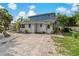 Cute bungalow with a brick paved driveway at 9 Grace St, Crystal Beach, FL 34681