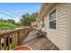 Wooden deck runs alongside the house with access from multiple points at 1501 28Th N Ave, St Petersburg, FL 33704