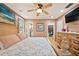 Main bedroom with king-size bed, walk-in closet, and hardwood floors at 1501 28Th N Ave, St Petersburg, FL 33704